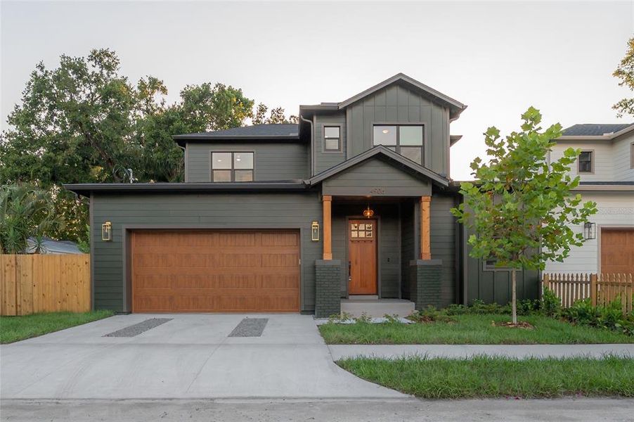 Front exterior of a new home in , Tampa, FL, highlighting curb appeal (Image 1).