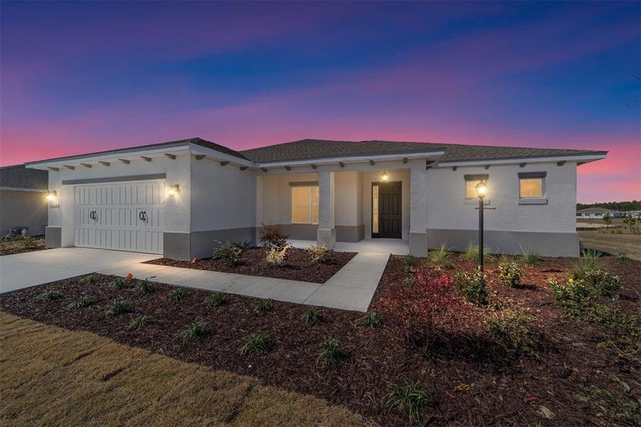 Front exterior of a new home in On Top of the World Communities, Ocala, FL, highlighting curb appeal (Image 21).
