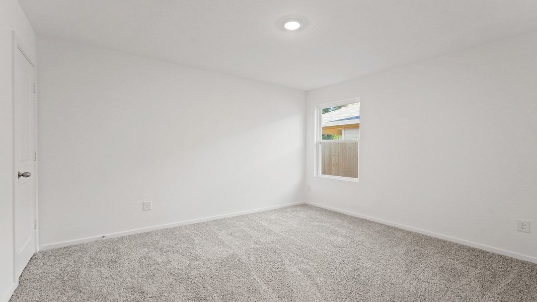 Representative unfurnished interior of a home built from the Lakeway by D.R. Horton in New Waverly Station, New Waverly (Image 20).