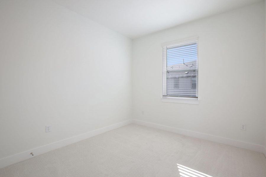 Spacious, unfurnished interior of a new home in Koenig Townhomes, Austin (Image 34).