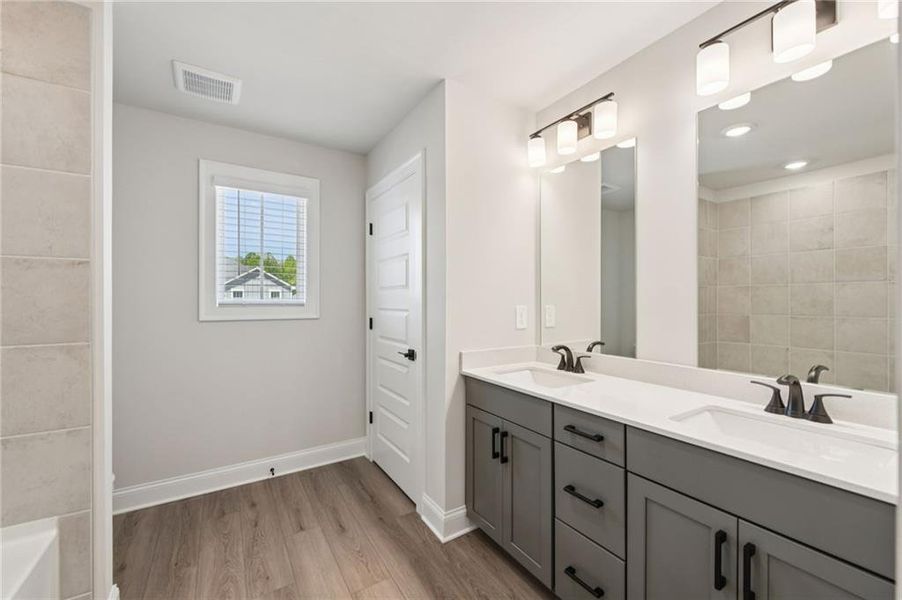 Furnished interior view inside a new home in Vines at Mill Creek - Estate Series, Braselton (Image 9).
