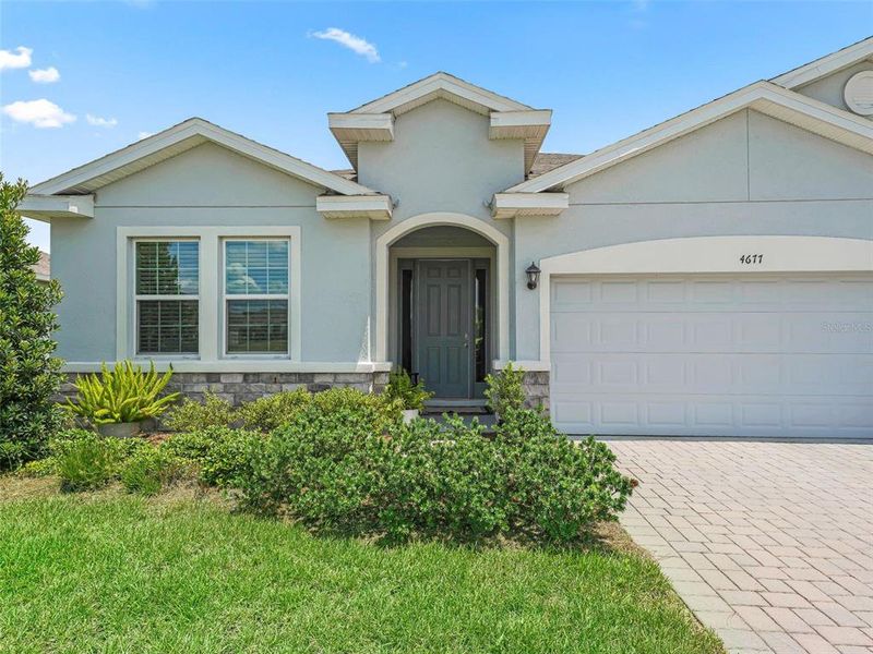 Front exterior of a new home in , Ocala, FL, highlighting curb appeal (Image 1).