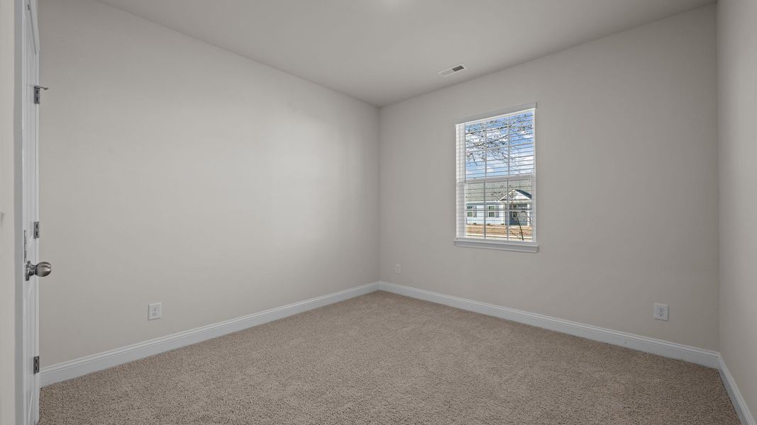 Spacious, unfurnished interior of a new home in Tyler - Home on the Lake, New Bern (Image 23).