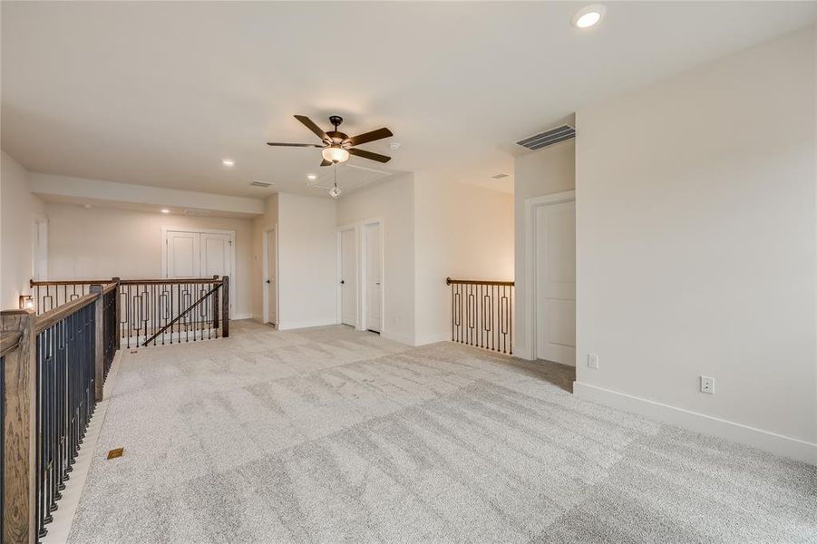 3 bedrooms are located off of the loft space, as well as the laundry room- easy access to the secondary bedrooms.