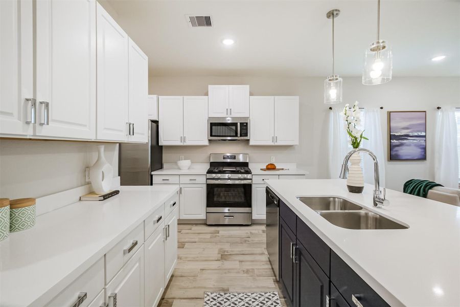 Photos are sample images from a previously built home with the same floor plan. Finishes and fixtures in the current home have been upgraded and may vary.