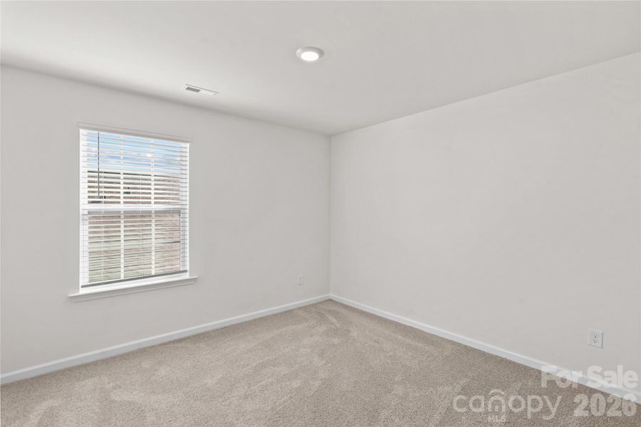 Spacious, unfurnished interior of a new home in Wallace Springs, Statesville (Image 37).