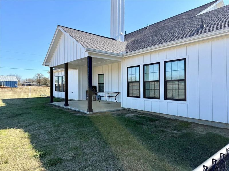 Exterior details and patio area of a home in , Point (Image 3).