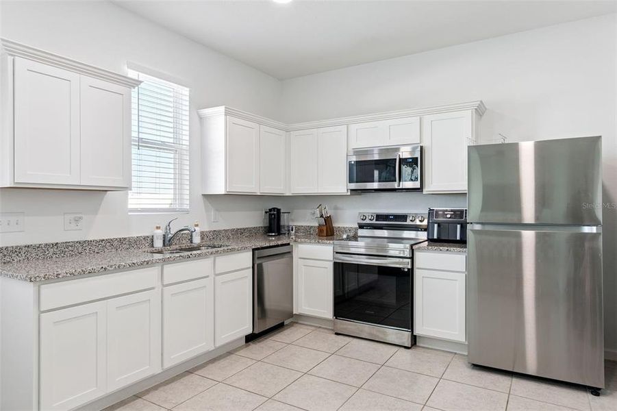 Furnished interior view inside a new home in Hills of Minneola, Minneola (Image 9).