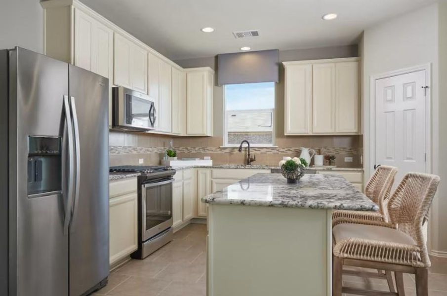 Photo of Pulte model home with same floor plan, not of actual home listed.