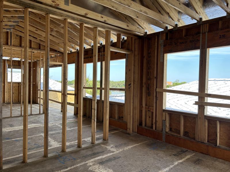Spacious, unfurnished interior of a new home in , Isle Of Palms (Image 14).