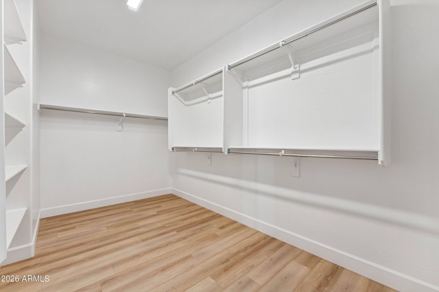 Primary Walk-In Closet Primary Walk-In Closet