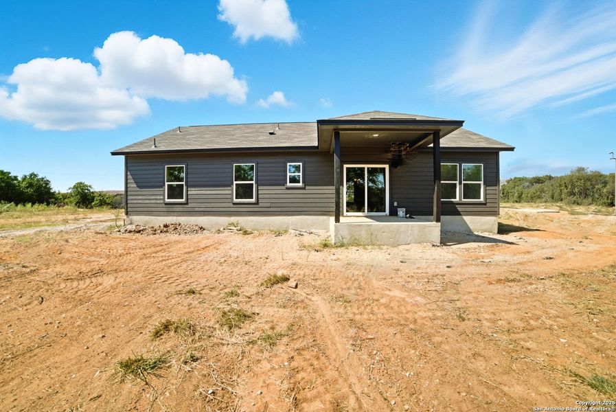 Exterior details and patio area of a home in , Atascosa (Image 3).