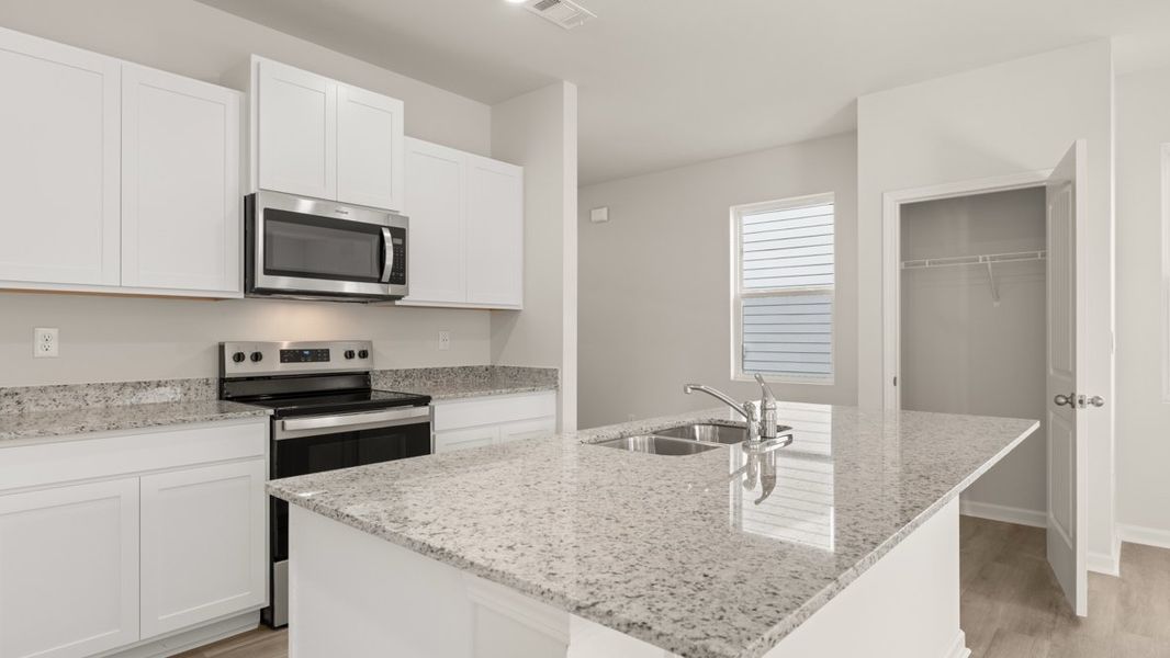 Representative furnished interior of a home built from the ELSTON by D.R. Horton in Pointe Park, Union City (Image 10).