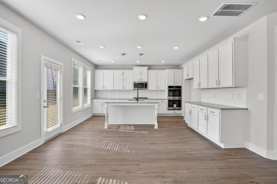 Furnished interior view inside a new home in The Fairways at Mirror Lake, Villa Rica (Image 43).