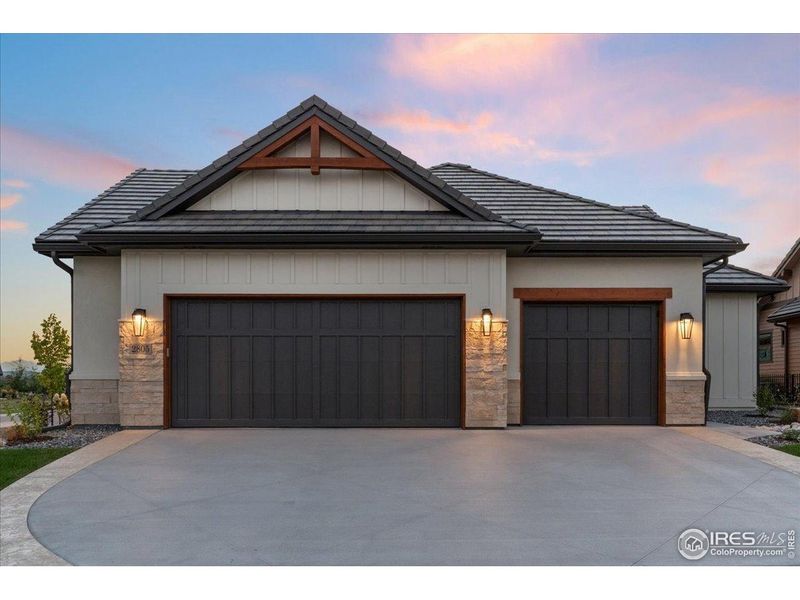 Front exterior of a new home in , Berthoud, CO, highlighting curb appeal (Image 20).