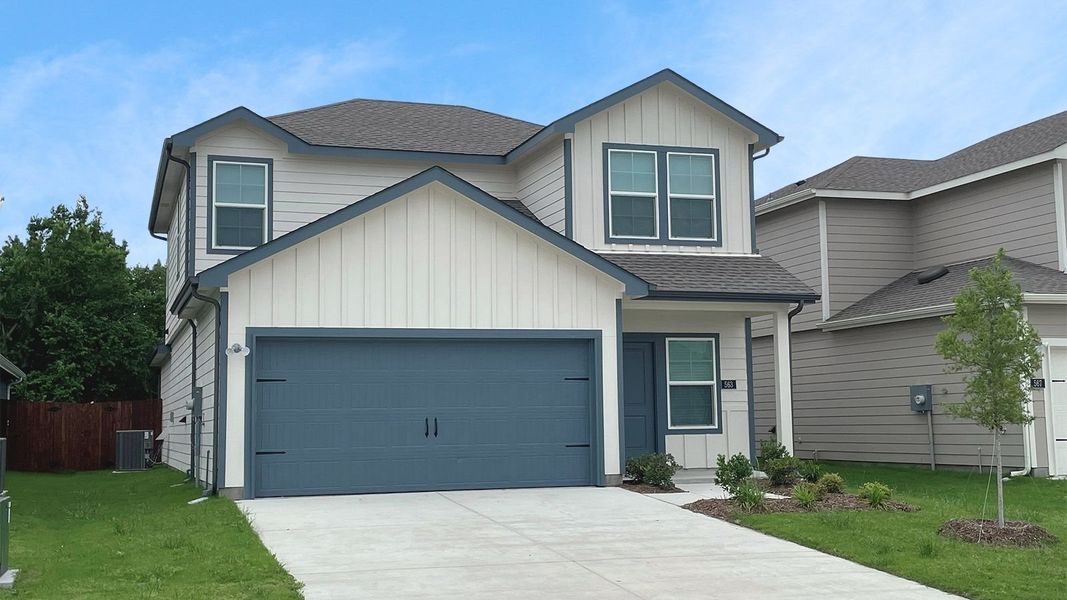 Front exterior of a new home in Wildwood, Royse City, TX, highlighting curb appeal (Image 1). Front exterior of a new home in Wildwood, Royse City, TX, highlighting curb appeal (Image 1).