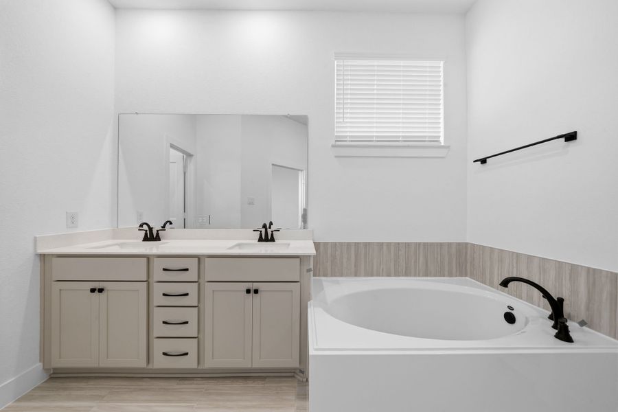 Furnished interior view inside a new home in Bridgeland, Cypress (Image 5).