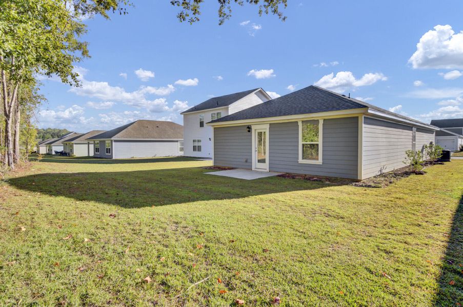 Exterior details and patio area of a home in Center Pointe, Santee (Image 15). Exterior details and patio area of a home in Center Pointe, Santee (Image 15).