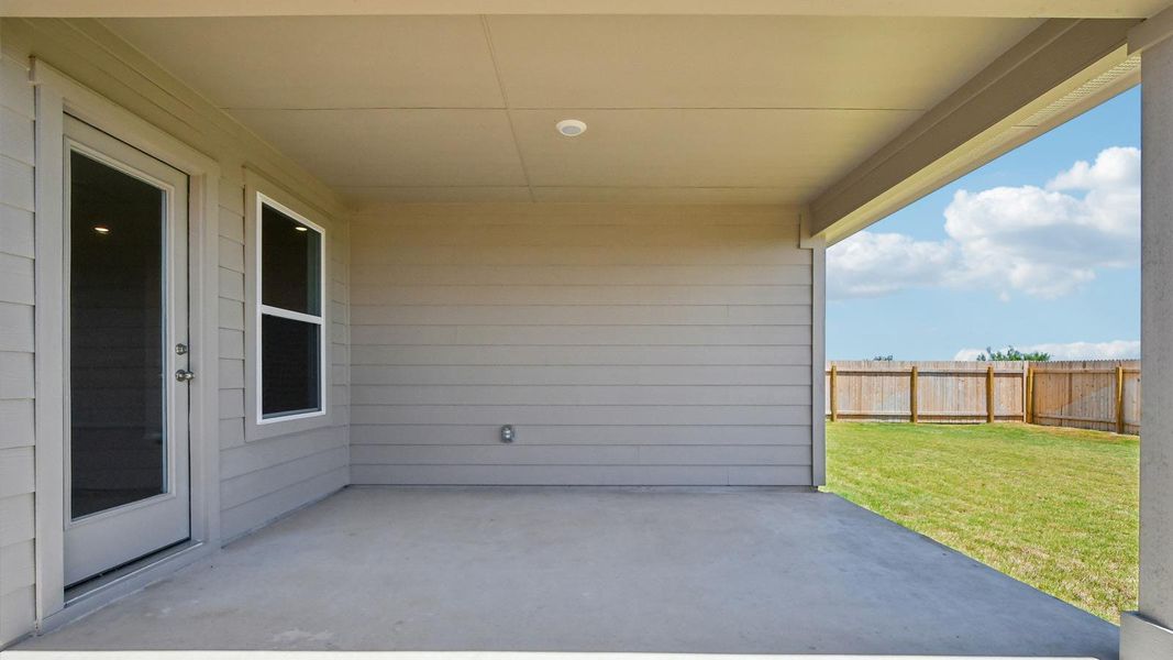 Exterior details and patio area of a home in Carillon, Manor (Image 3).