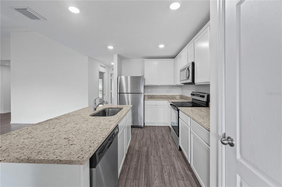 Furnished interior view inside a new home in , Port Charlotte (Image 3).