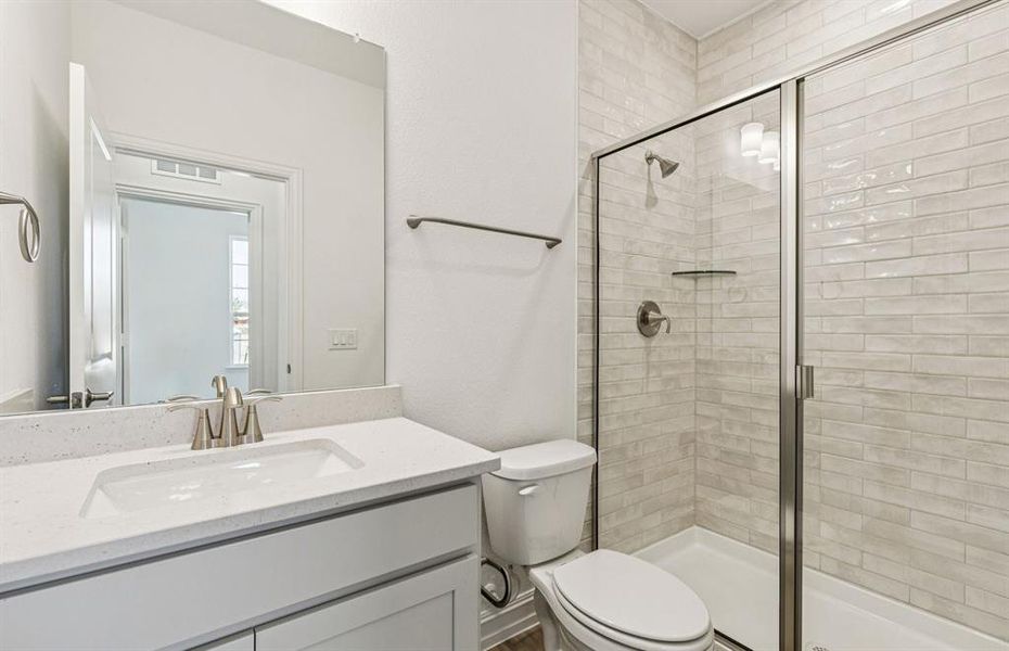 Upgraded secondary bath with elegant finishes Upgraded secondary bath with elegant finishes