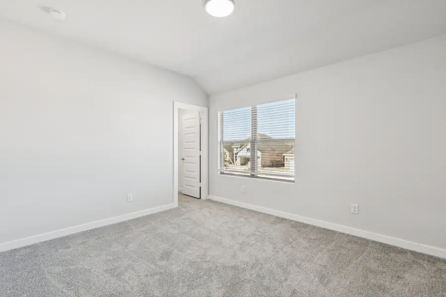 Bedroom in the Winters home plan by Trophy Signature Homes – REPRESENTATIVE PHOTO Bedroom in the Winters home plan by Trophy Signature Homes – REPRESENTATIVE PHOTO