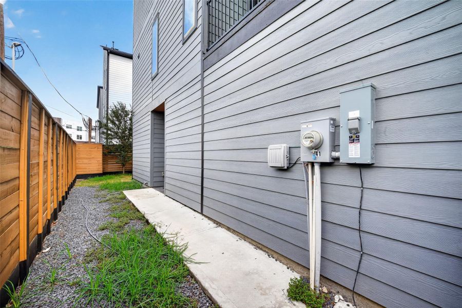 Exterior details and patio area of a home in , Houston (Image 3).