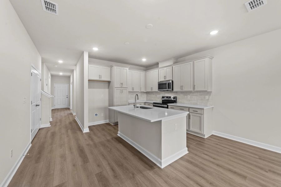 Furnished interior view inside a new home in Blue Heron Retreat, Little River (Image 8).