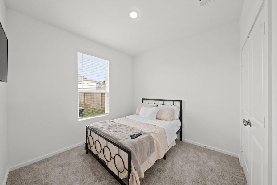 Furnished interior view inside a new home in Decker Farms, Magnolia (Image 18).