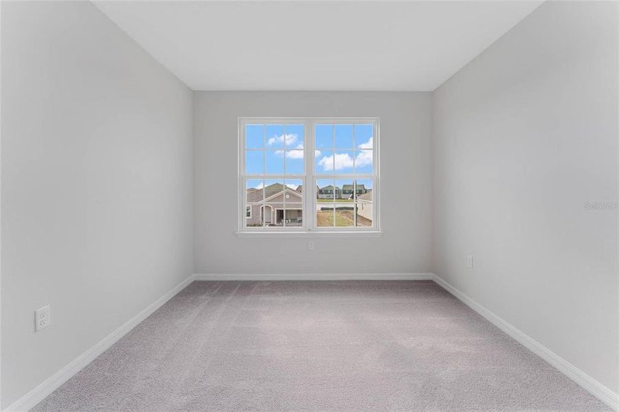 Spacious, unfurnished interior of a new home in Covered Bridge at Liberty Bluff, Haines City (Image 32).