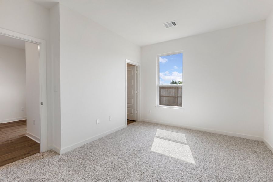 Spacious, unfurnished interior of a new home in Townhomes at Yaupon Trails, Bryan (Image 7). Spacious, unfurnished interior of a new home in Townhomes at Yaupon Trails, Bryan (Image 7).