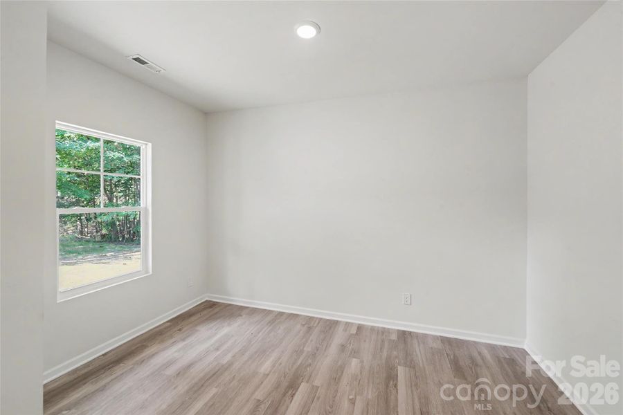 Spacious, unfurnished interior of a new home in , Iron Station (Image 31).