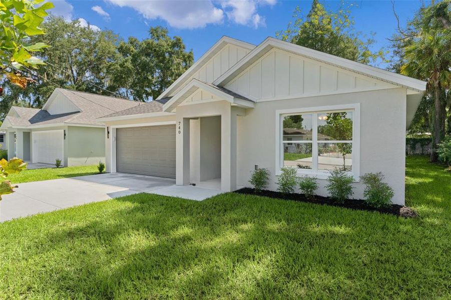 Front exterior of a new home in , Wildwood, FL, highlighting curb appeal (Image 20).