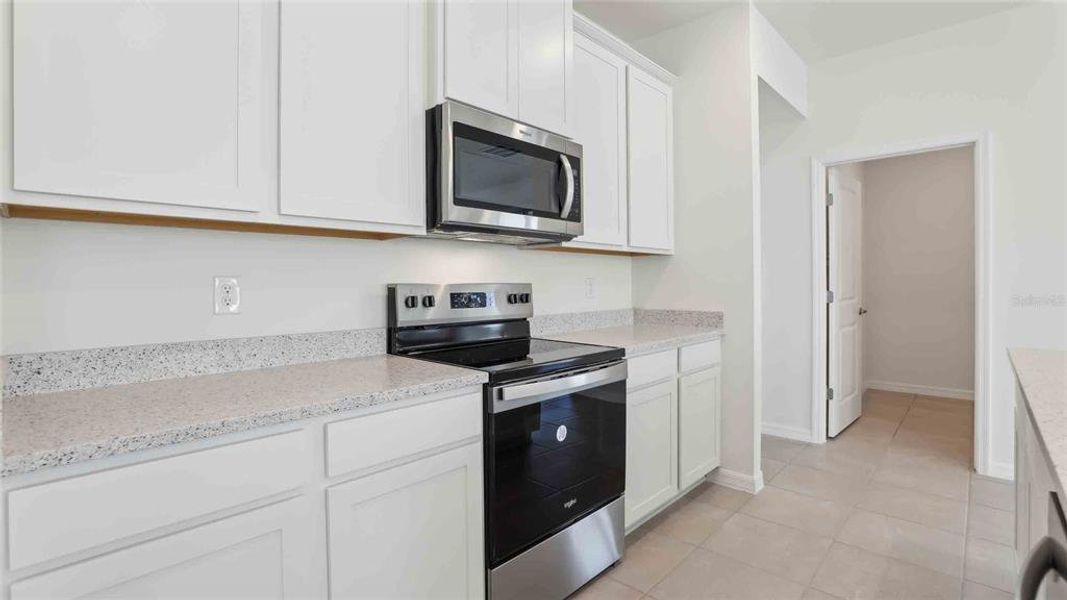 Furnished interior view inside a new home in Twisted Oaks, Wildwood (Image 10).