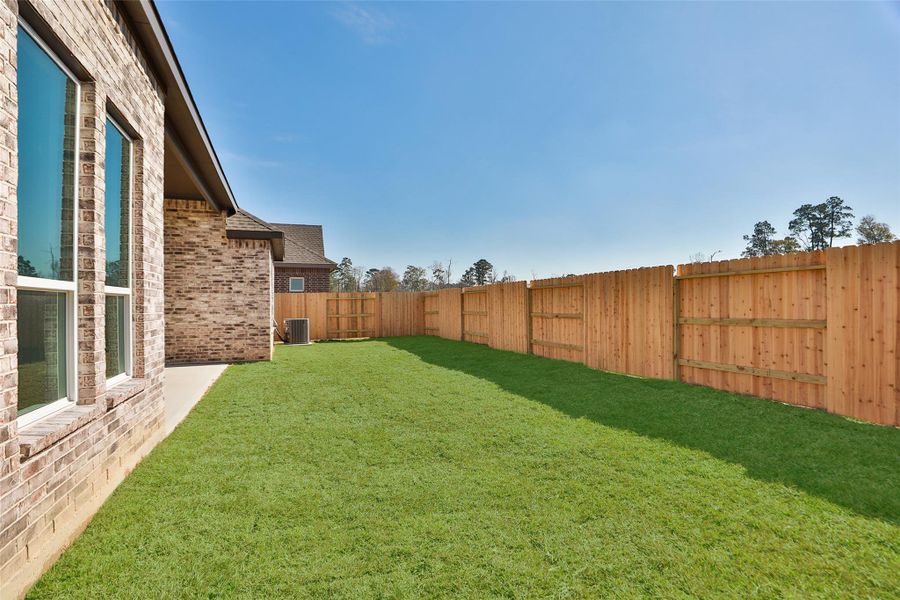 Exterior details and patio area of a home in Sundance Cove, Crosby (Image 24). Exterior details and patio area of a home in Sundance Cove, Crosby (Image 24).
