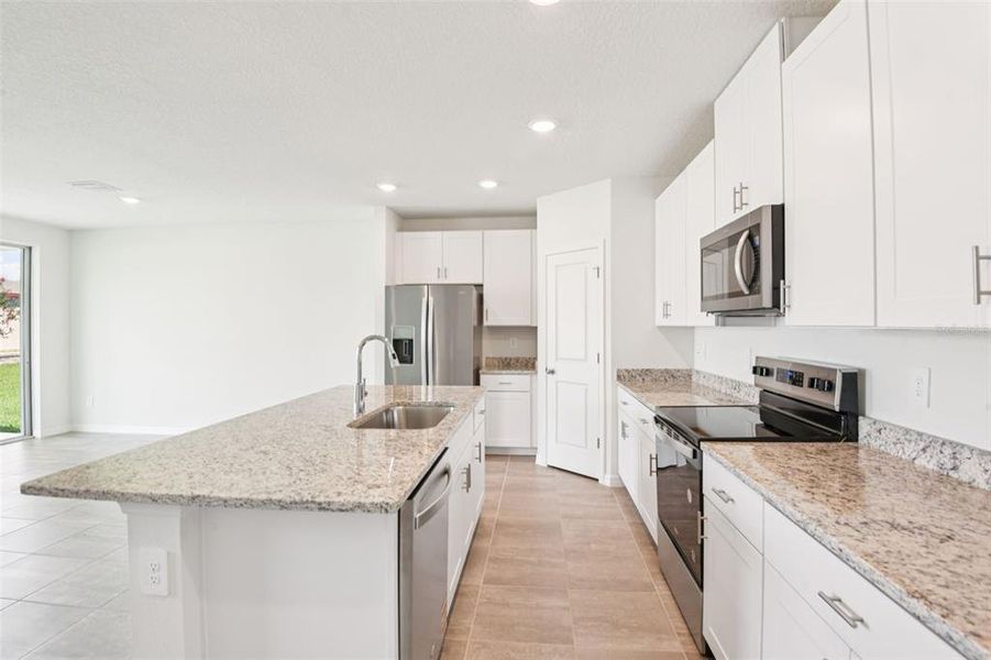 Furnished interior view inside a new home in Two Rivers - Classic Series, Zephyrhills (Image 5).