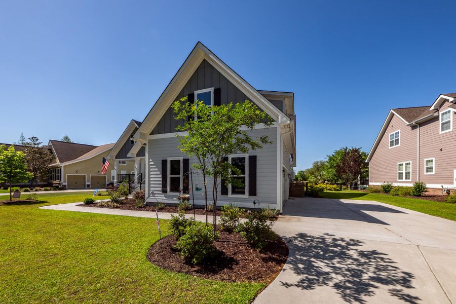 Front exterior of a new home in , Charleston, SC, highlighting curb appeal (Image 26).