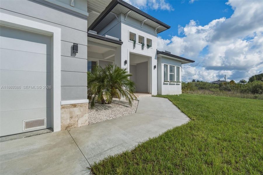 Exterior details and patio area of a home in , Port Charlotte (Image 26). Exterior details and patio area of a home in , Port Charlotte (Image 26).