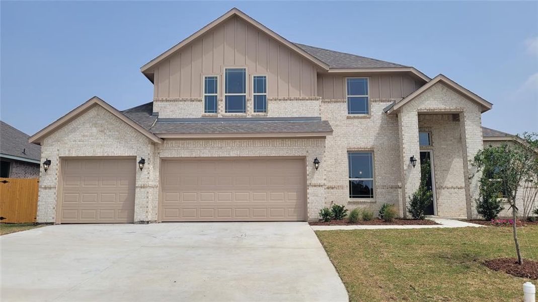 Front exterior of a new home in Cole Crossing Estates, DeSoto, TX, highlighting curb appeal (Image 15).
