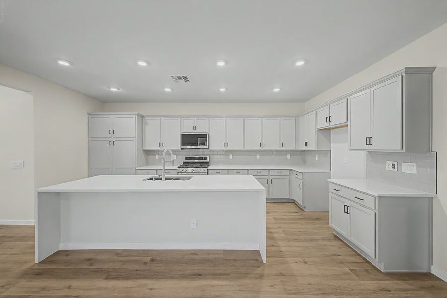 Furnished interior view inside a new home in Avanti at Granite Vista, Waddell (Image 7).