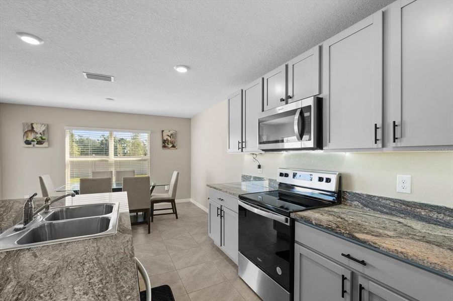 Furnished interior view inside a new home in Silverstone North, Palmetto (Image 4).