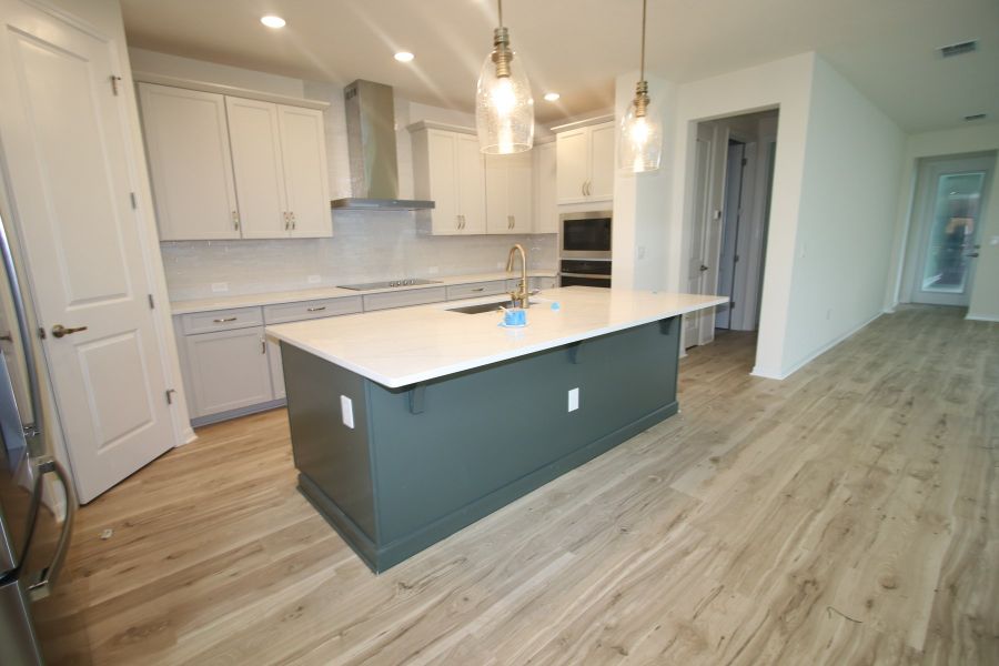 Furnished interior view inside a new home in Weslyn Park in Sunbridge 34', St. Cloud (Image 5).