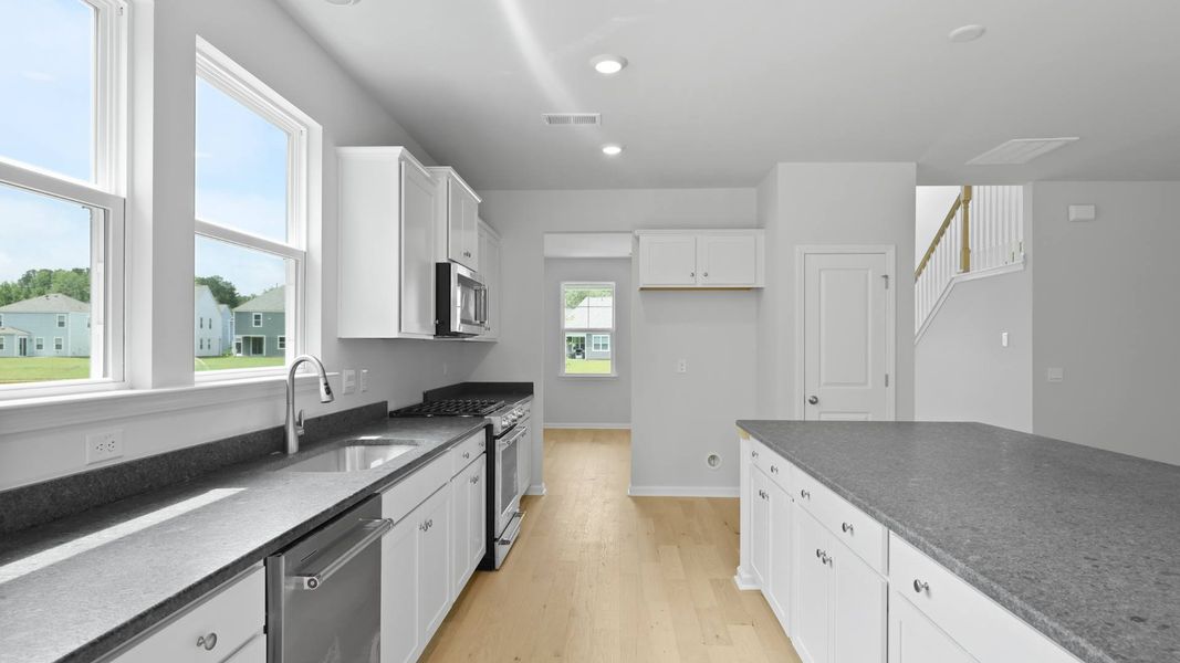 Representative furnished interior of a home built from the FORRESTER by D.R. Horton in Founders Corner, Summerville (Image 4).