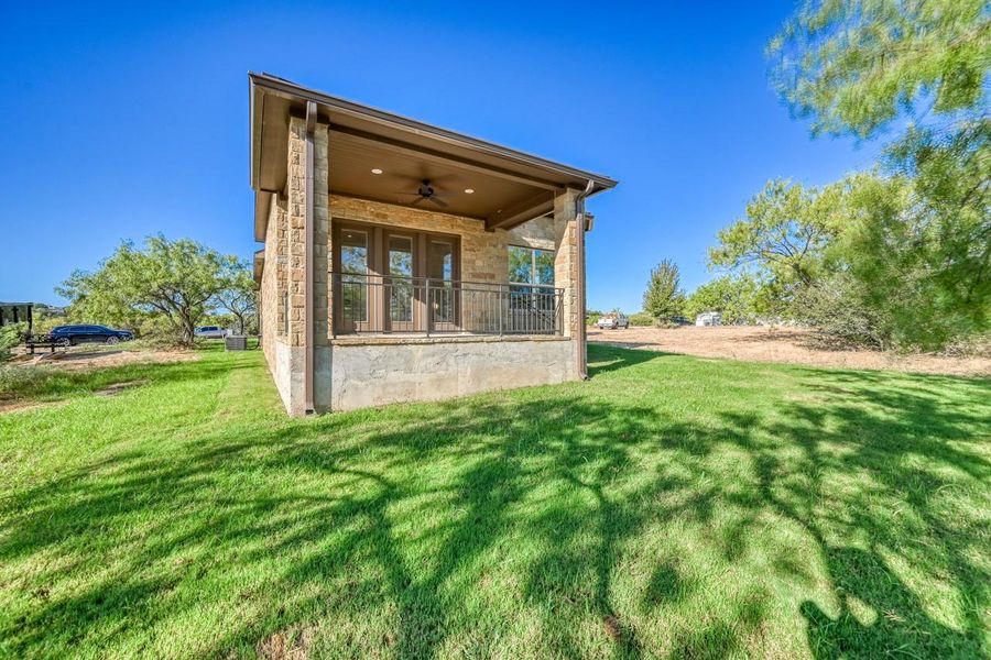 Exterior details and patio area of a home in , Horseshoe Bay (Image 3).