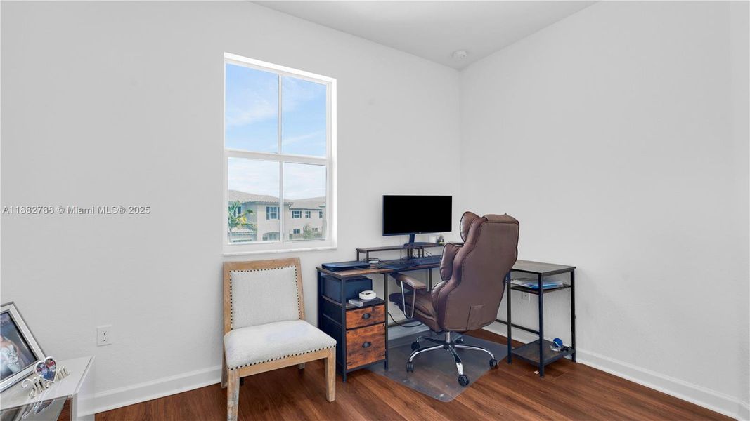 Upgraded vinyl wood flooring flows seamlessly throughout the entire upstairs, including the staircase.