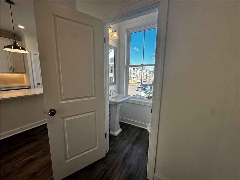 Upper Level Hallway featuring Guest Bedroom 2, Owners Suite, Laundry & Linen Closet