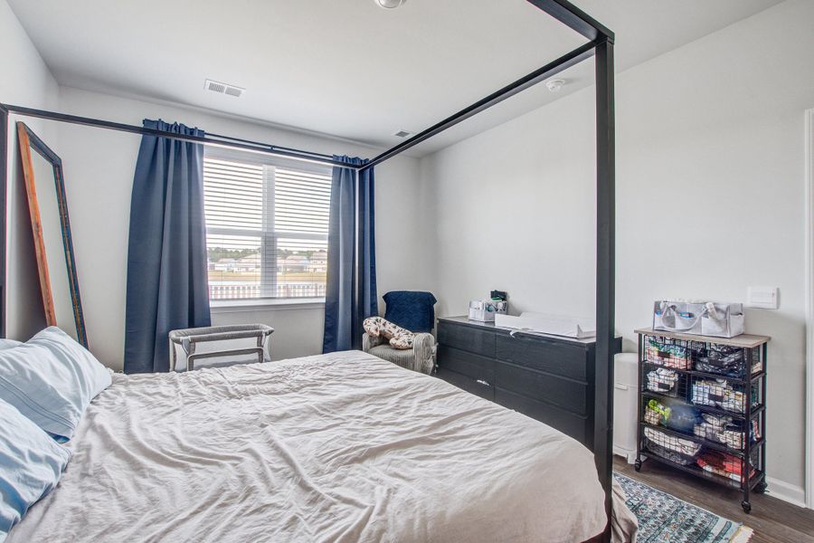 Furnished interior view inside a new home in Pine Hills at Cane Bay, Summerville (Image 19).