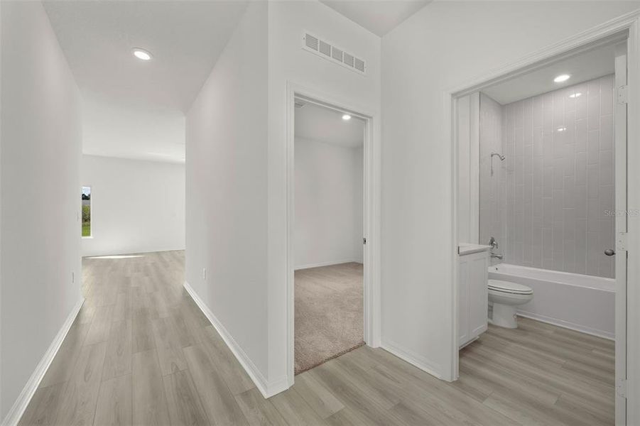 Spacious, unfurnished interior of a new home in Peach Crossings, Winter Haven (Image 22).