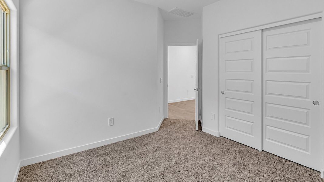 Representative unfurnished interior of a home built from the Parker by D.R. Horton in The Oasis at Rocking K, Vail (Image 32).