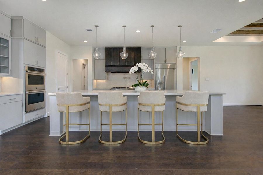 Kitchen is Jennair Stainless steel appliance package. *Virtually Staged